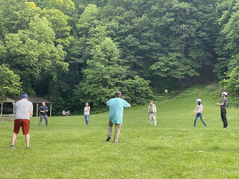 Aston Group playing ball at Happy Hollow Park.